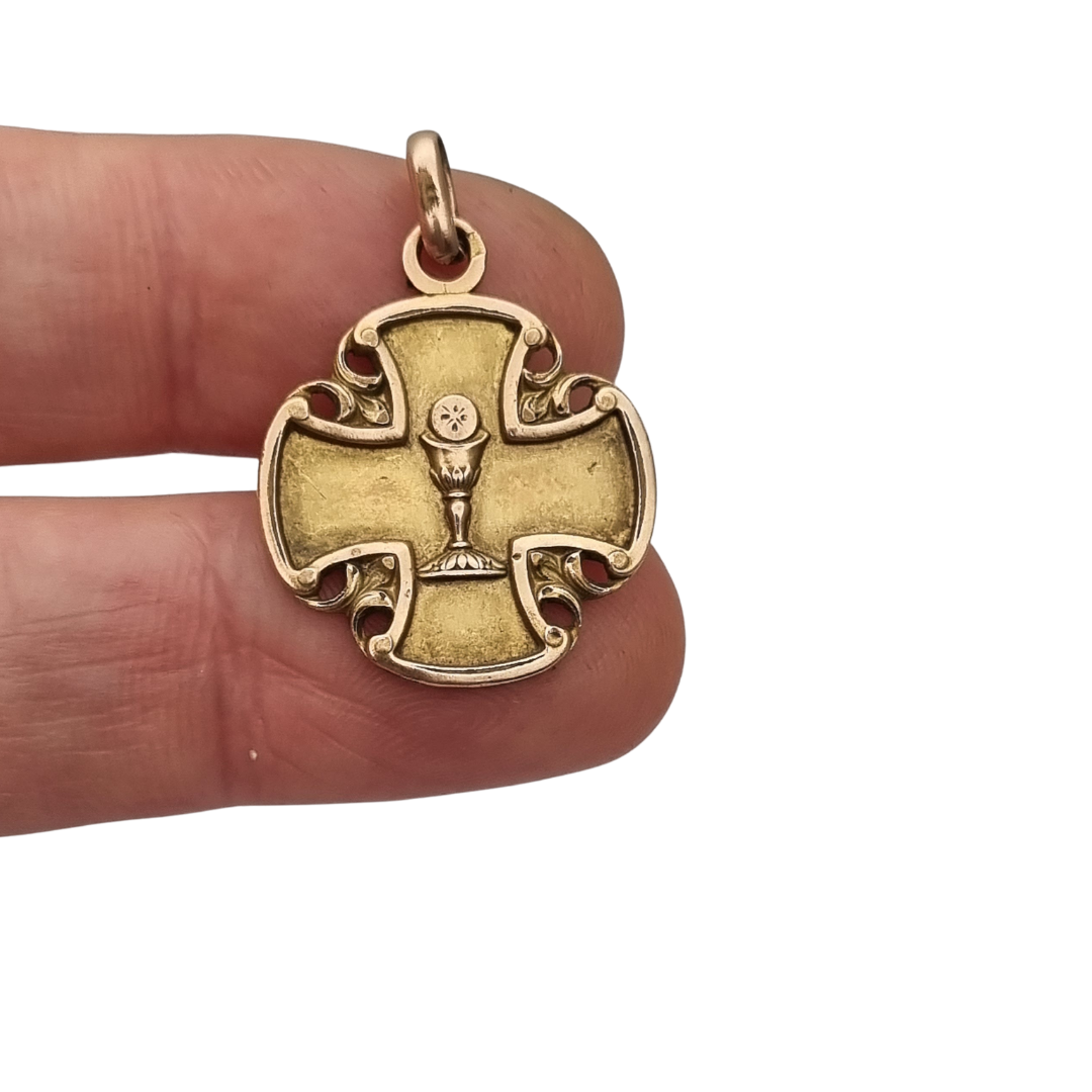 Antique religious medal in openwork gilt cross with chalice, circa 1920