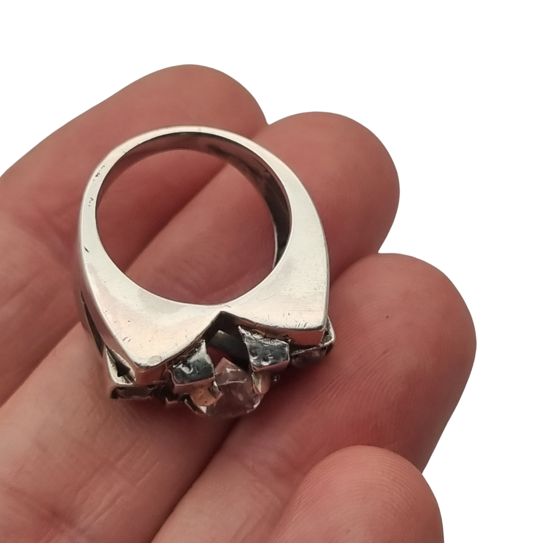 Art Deco ring in silver with gold accents and colorless stones, circa 1940–1950