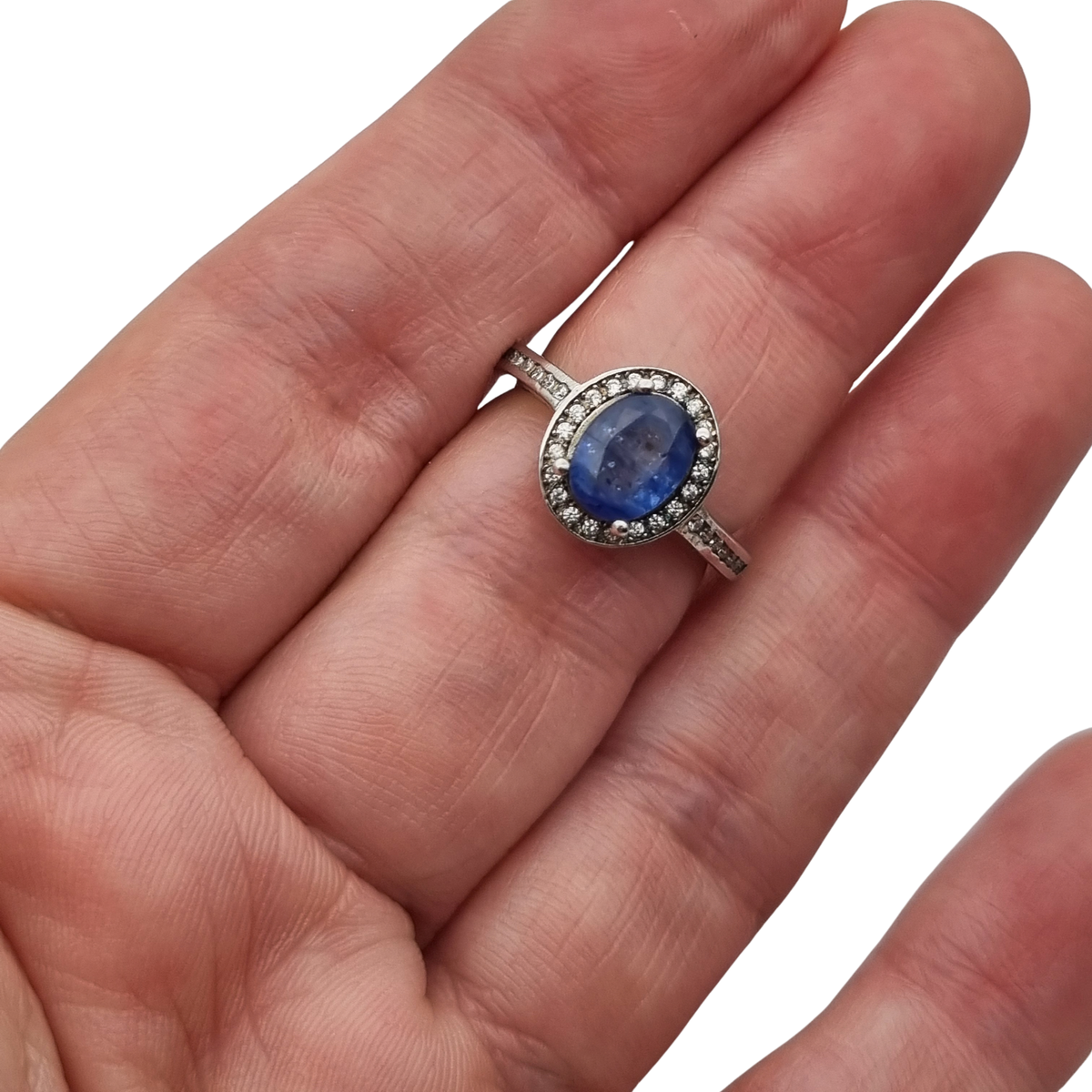 Vintage 925 sterling silver ring with blue stone, Diana style with halo, circa 1990-2000