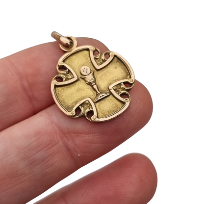 Antique religious medal in openwork gilt cross with chalice, circa 1920