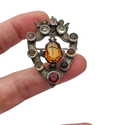 Victorian Scottish Luckenbooth brooch in silver with polychrome and Cairngorm quartzes, registered design 1866