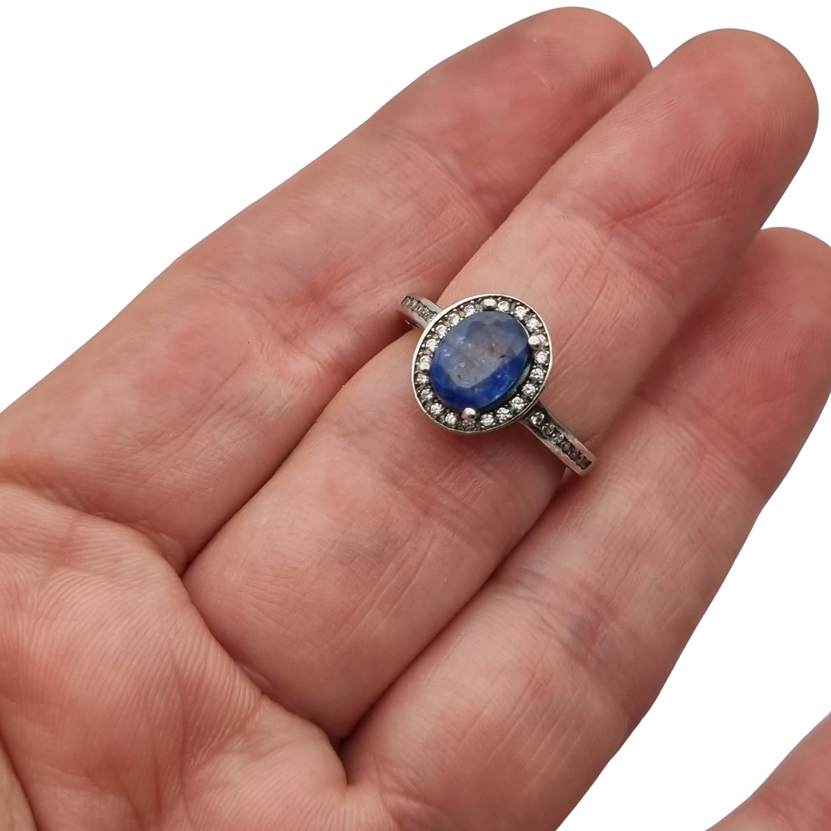 Vintage 925 sterling silver ring with blue stone, Diana style with halo, circa 1990-2000