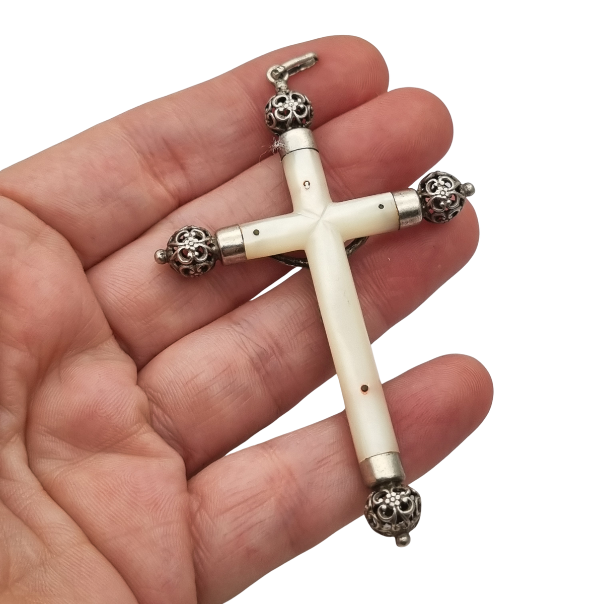 Antique silver and mother-of-pearl hanging crucifix, openwork finials of Neo-Gothic inspiration, Europe, ca. 1900–1930