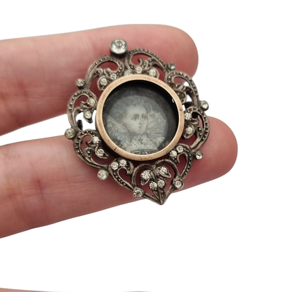Victorian silver brooch with gold accents, painted miniature, and gemstones, France 1890-1900