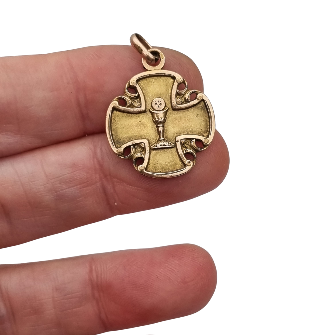 Antique religious medal in openwork gilt cross with chalice, circa 1920