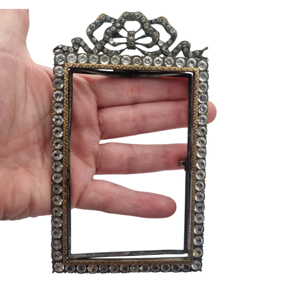 Belle Époque photo frame with glass panels and a Louis XVI bow, likely French, ca. 1890–1910
