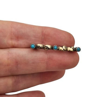 Antique Art Deco silver brooch with gold highlights and blue cabochons, Spain, ca. 1930–1940
