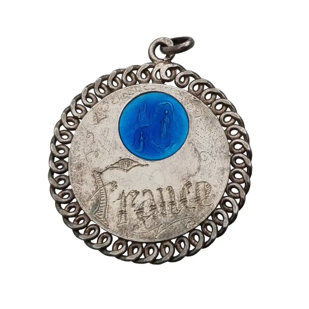 Medalla religiosa de la virgen lourdes francia 1959 en plata y esmalte azul.