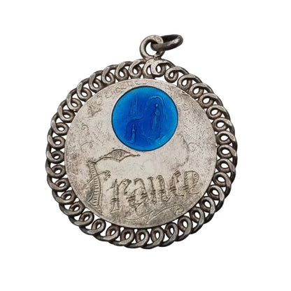 Medalla religiosa de la virgen lourdes francia 1959 en plata y esmalte azul.