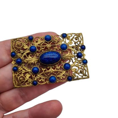 Broche modernista rectangular dorado y azul de los años 40 para mujer.