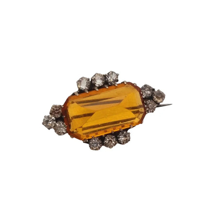 Broche vintage art deco de plata con pedrería naranja y blanca regalo ideal.