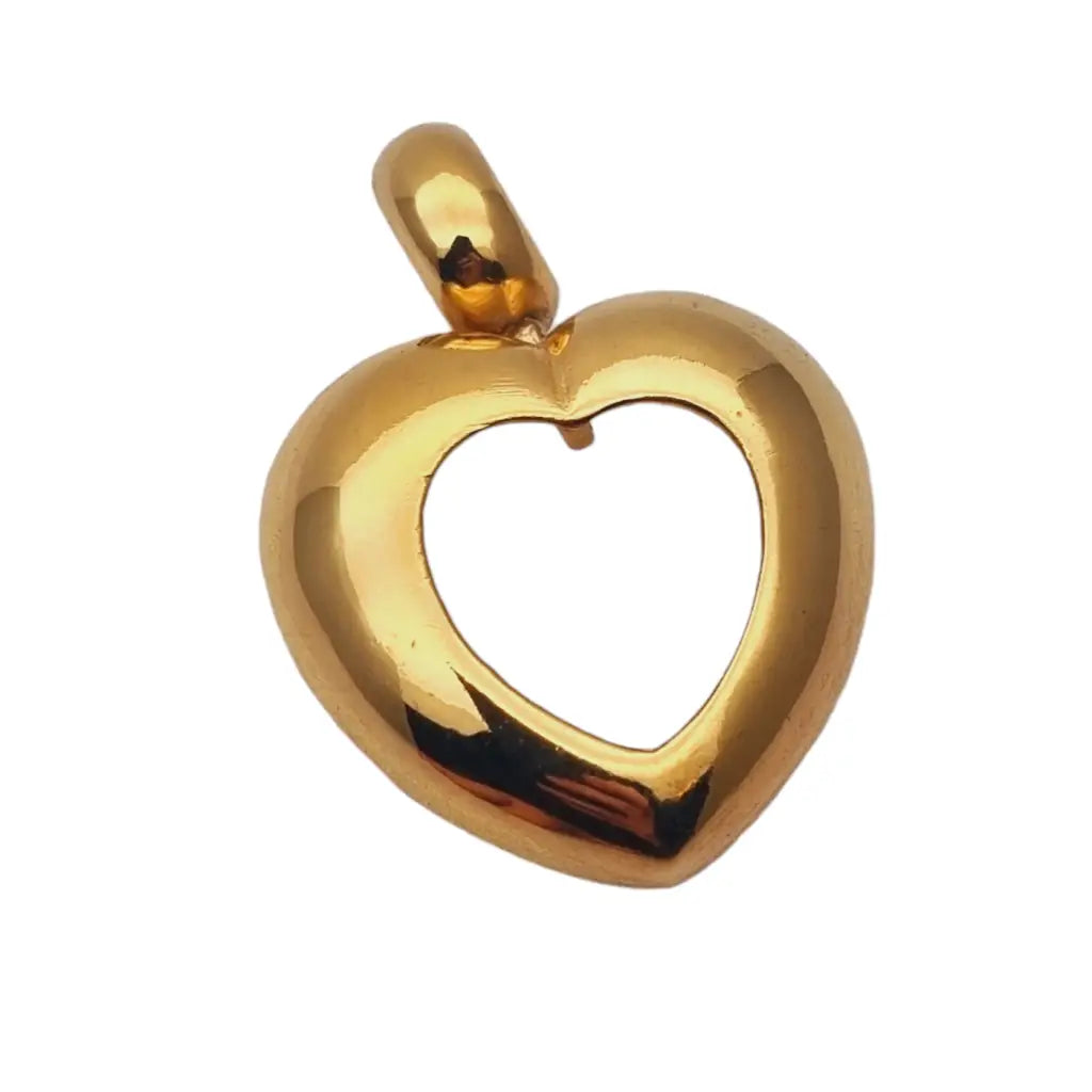 Colgante corazón dorado de agatha paris joyería chic francesa 80s.