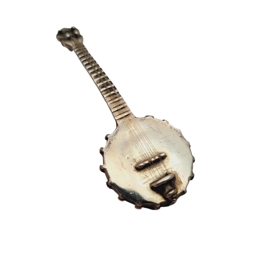 Figura banjo miniatura de plata ley instrumento musical para coleccionar.