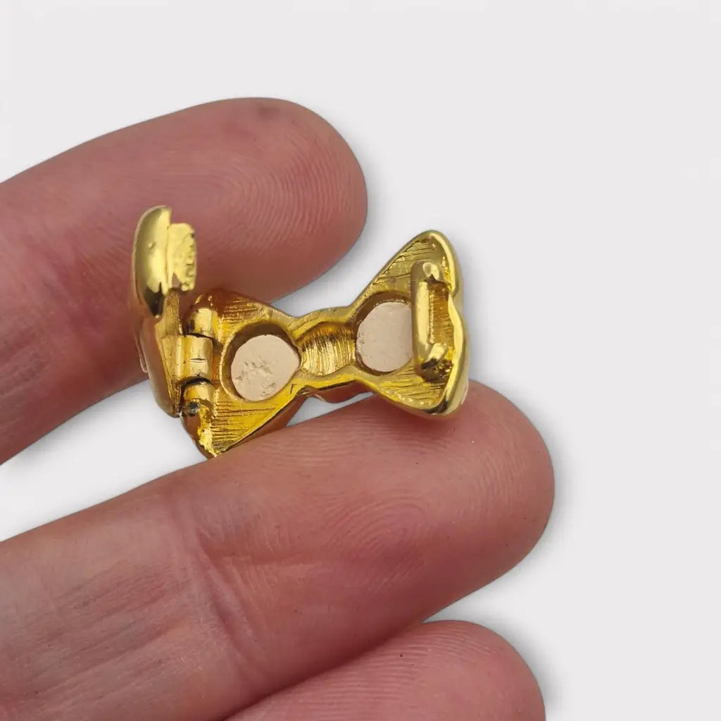 Acortador de collar con lazo dorado elegante y funcional años 80. Gargantilla