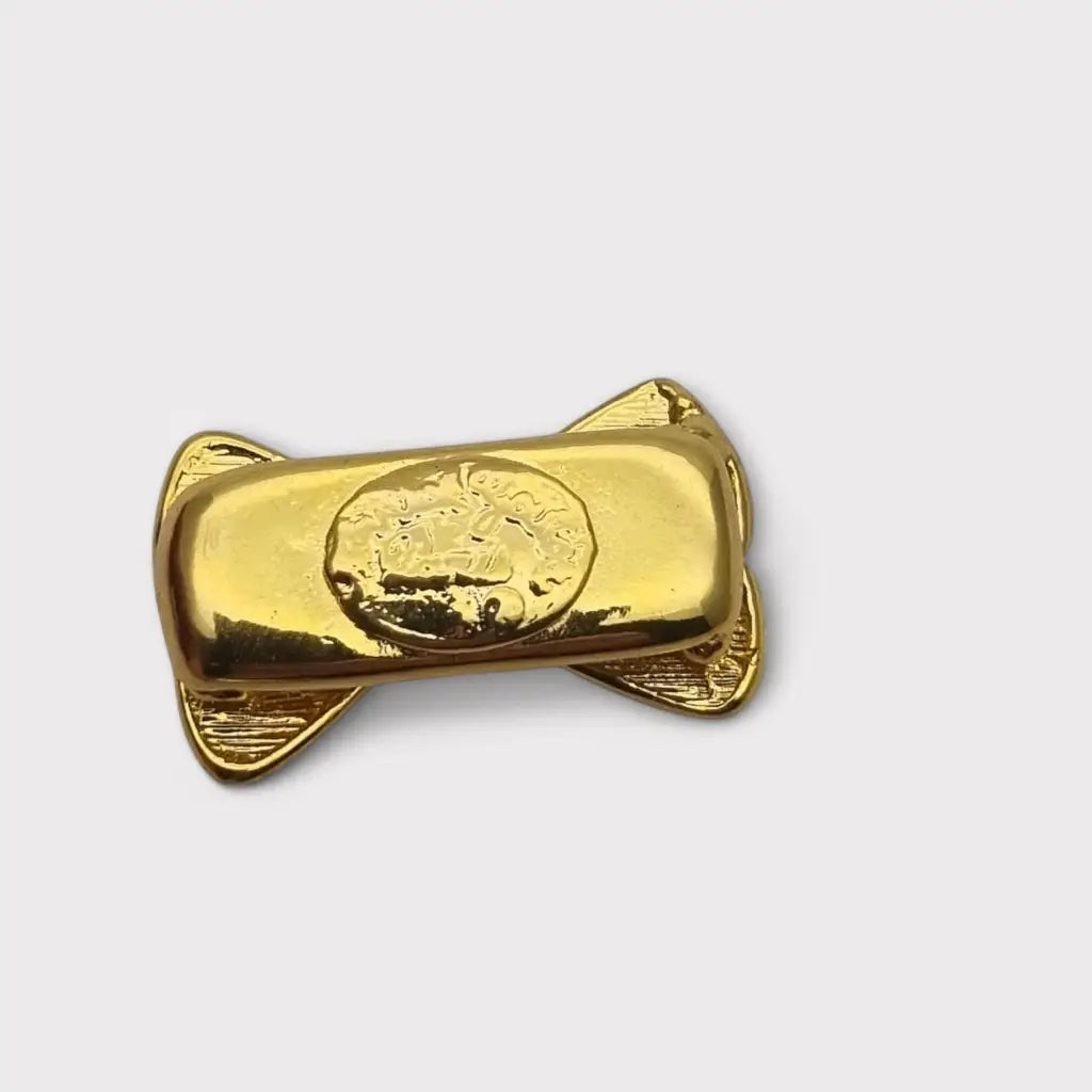 Acortador de collar con lazo dorado elegante y funcional años 80. Gargantilla