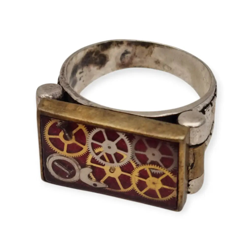 Anillo steampunk artesanal en plata 925 con engranajes antiguos de relojes