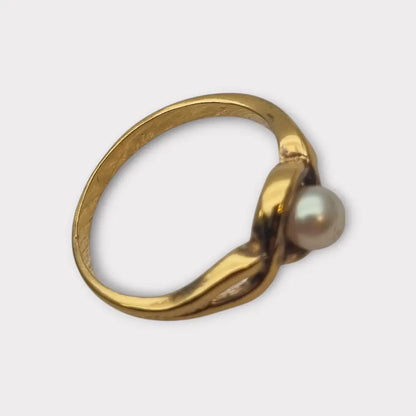 Anillo vintage en plata bañada oro con perla diseño entrelazado Circa 1960