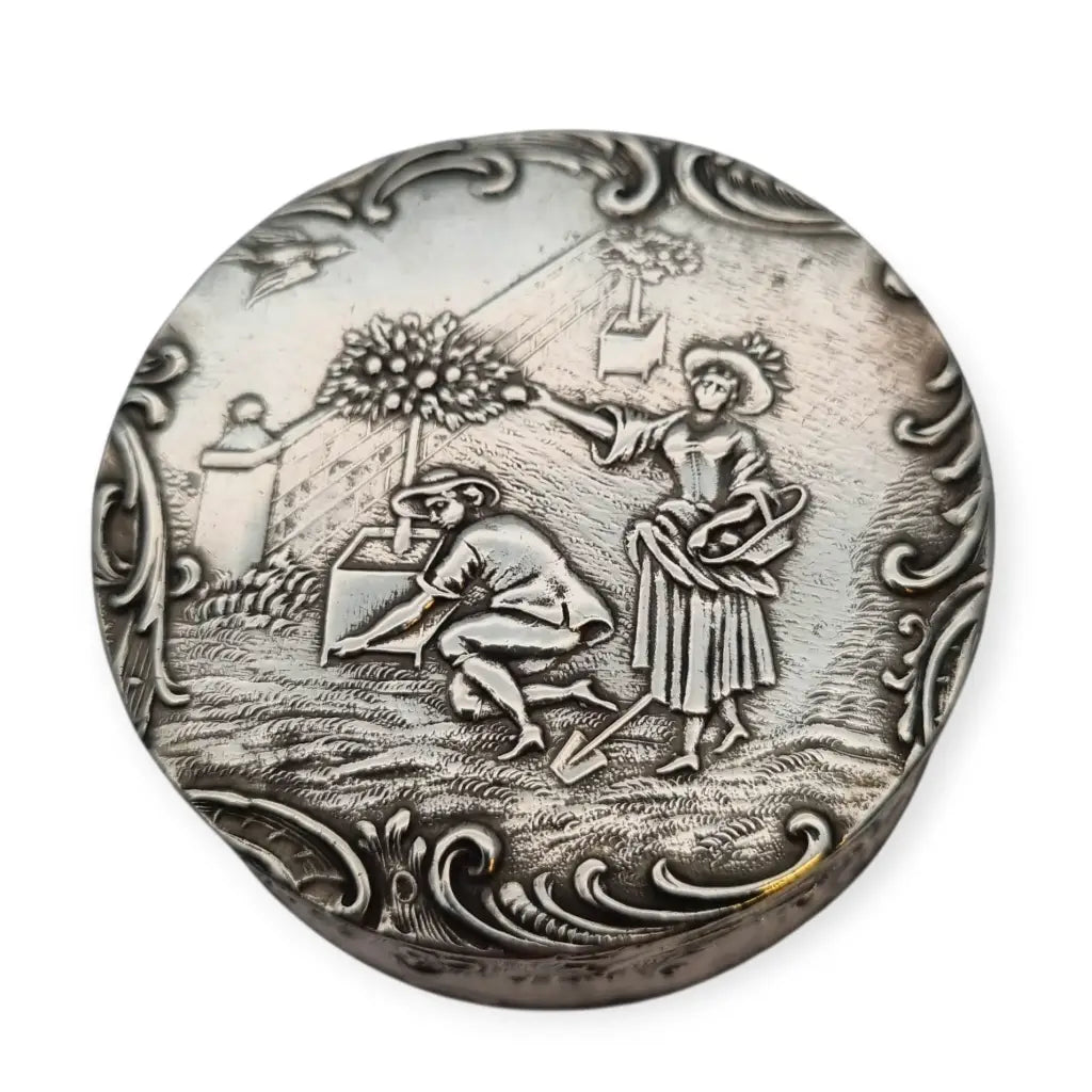 Antigua caja redonda alemana de plata 800 con escena bucólica jardín