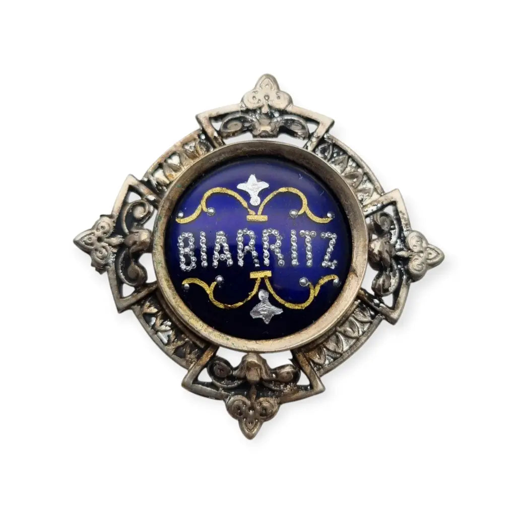 Antiguo broche Belle Époque de souvenir Biarritz esmalte azul circa 1900.