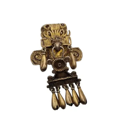 Broche azteca mixteca de plata del dios sol tumba 7 monte albán oxaca.