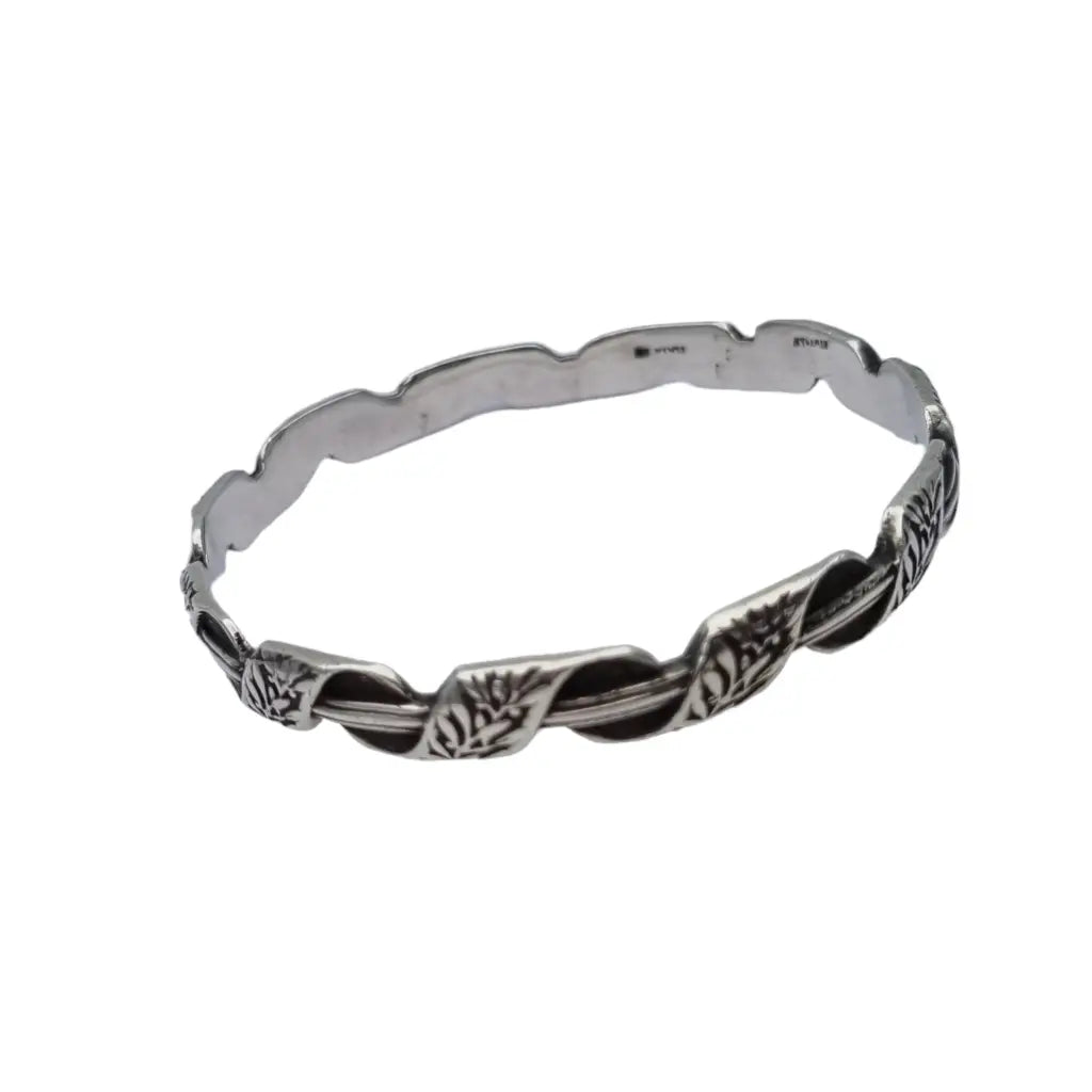 Brazalete antiguo rígido de plata k. Thamar con decoración floral para mujer.