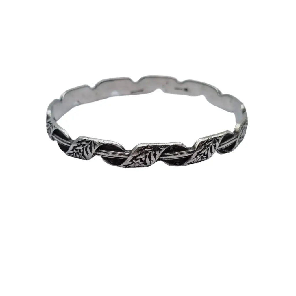 Brazalete antiguo rígido de plata k. Thamar con decoración floral para mujer.