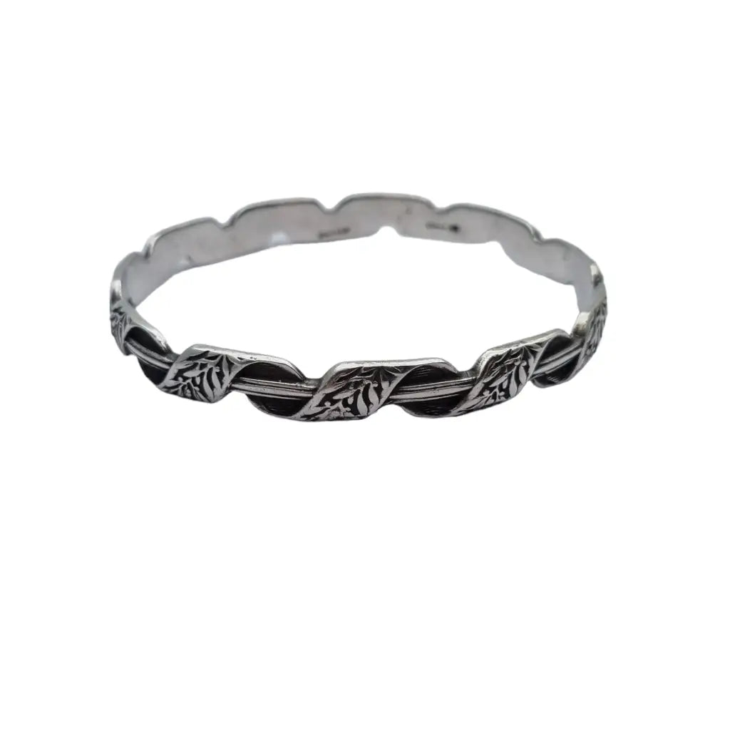 Brazalete antiguo rígido de plata k. Thamar con decoración floral para mujer.