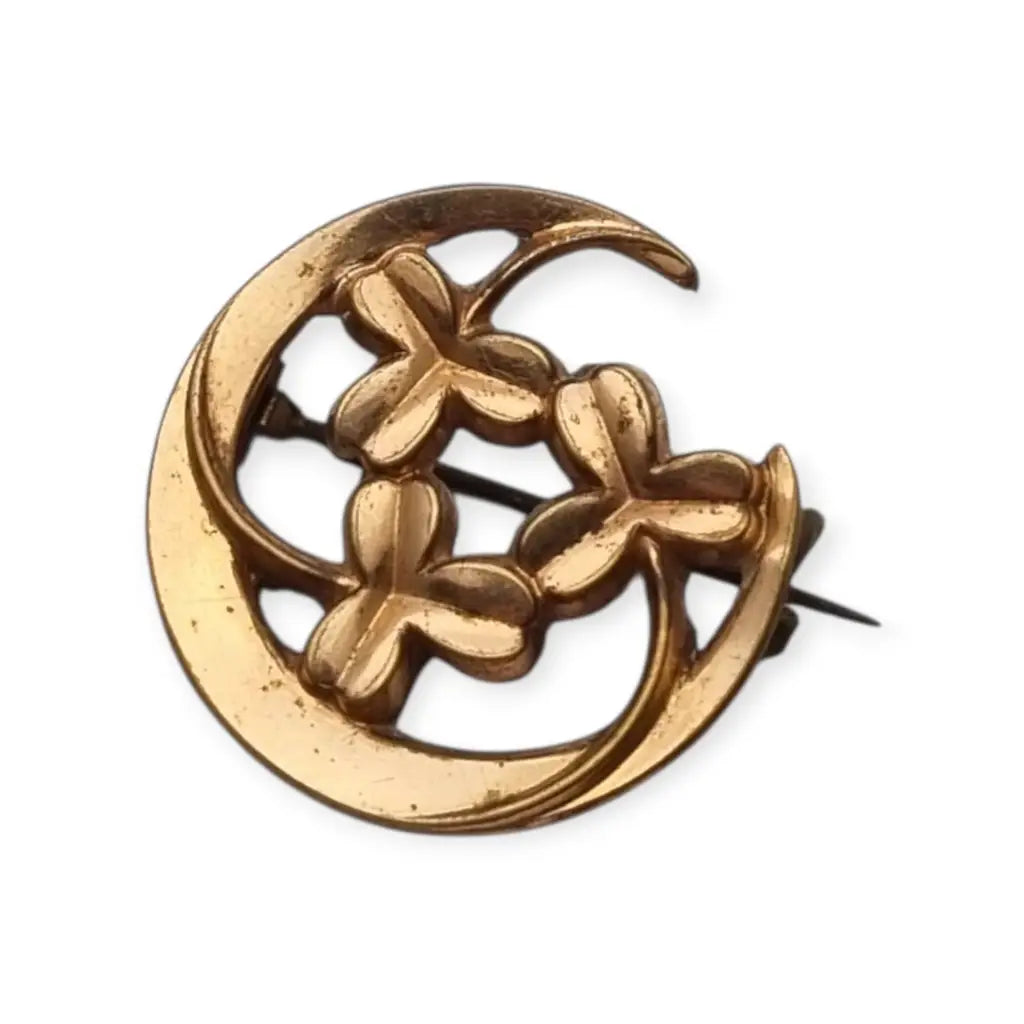 Broche antiguo art nouveau tréboles y luna creciente metal color dorado