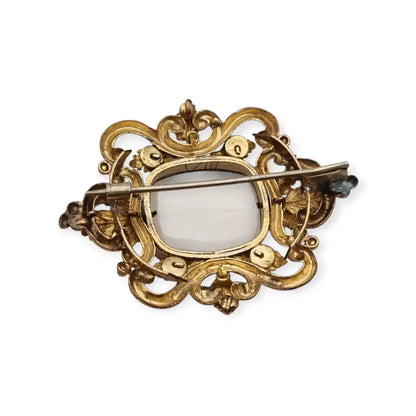 Broche antiguo dorado Art Nouveau con piedra blanca central Joyería modernista