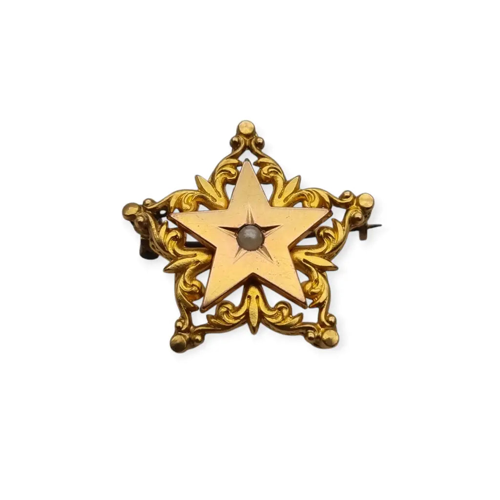 Broche antiguo de estrella victoriano oro FIX con perla coleccionable 1900.