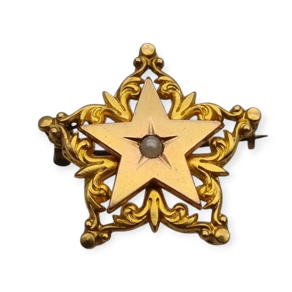 Broche antiguo de estrella victoriano oro FIX con perla coleccionable 1900.