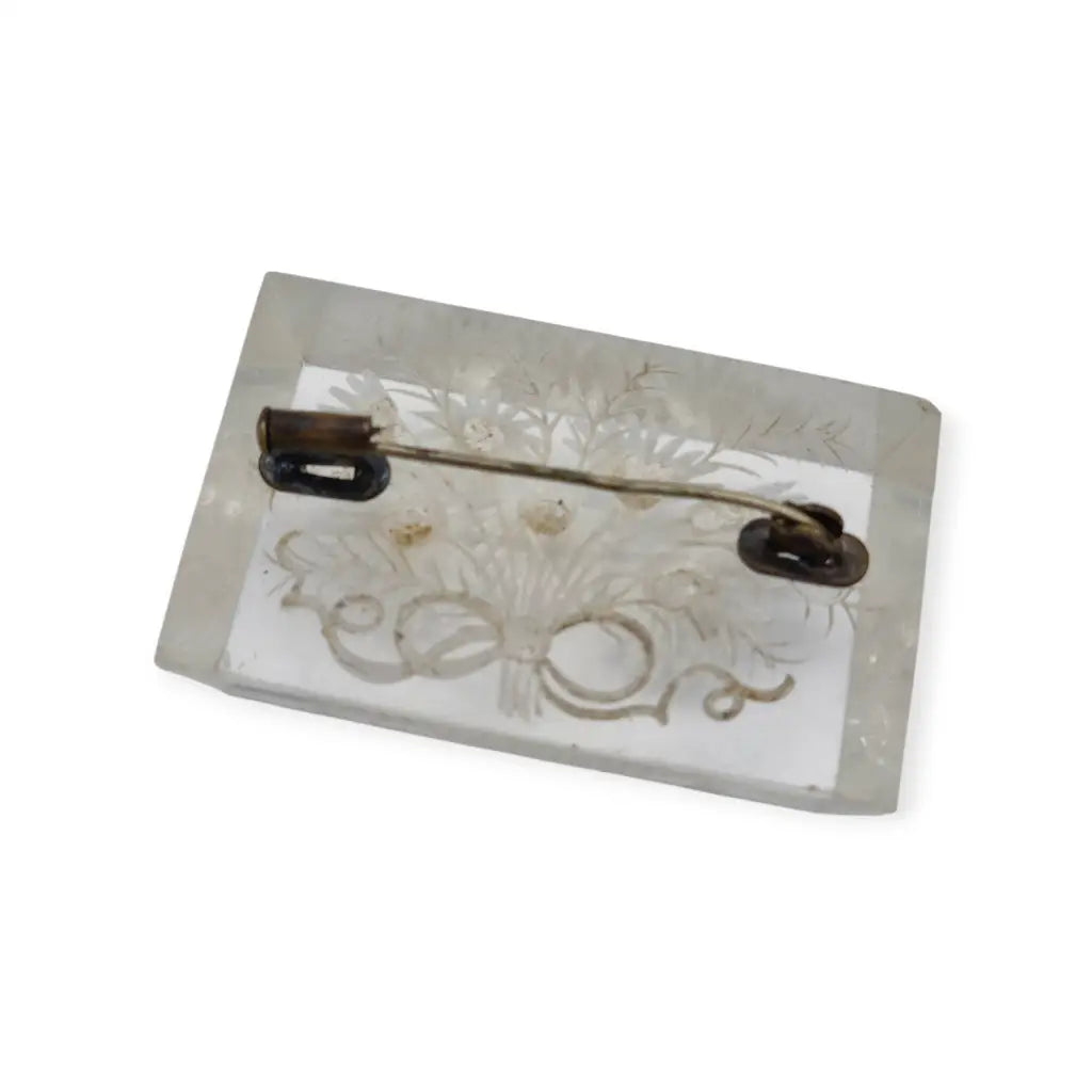 Broche antiguo de lucite transparente años 40–50 con flores talladas