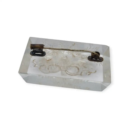 Broche antiguo de lucite transparente años 40–50 con flores talladas
