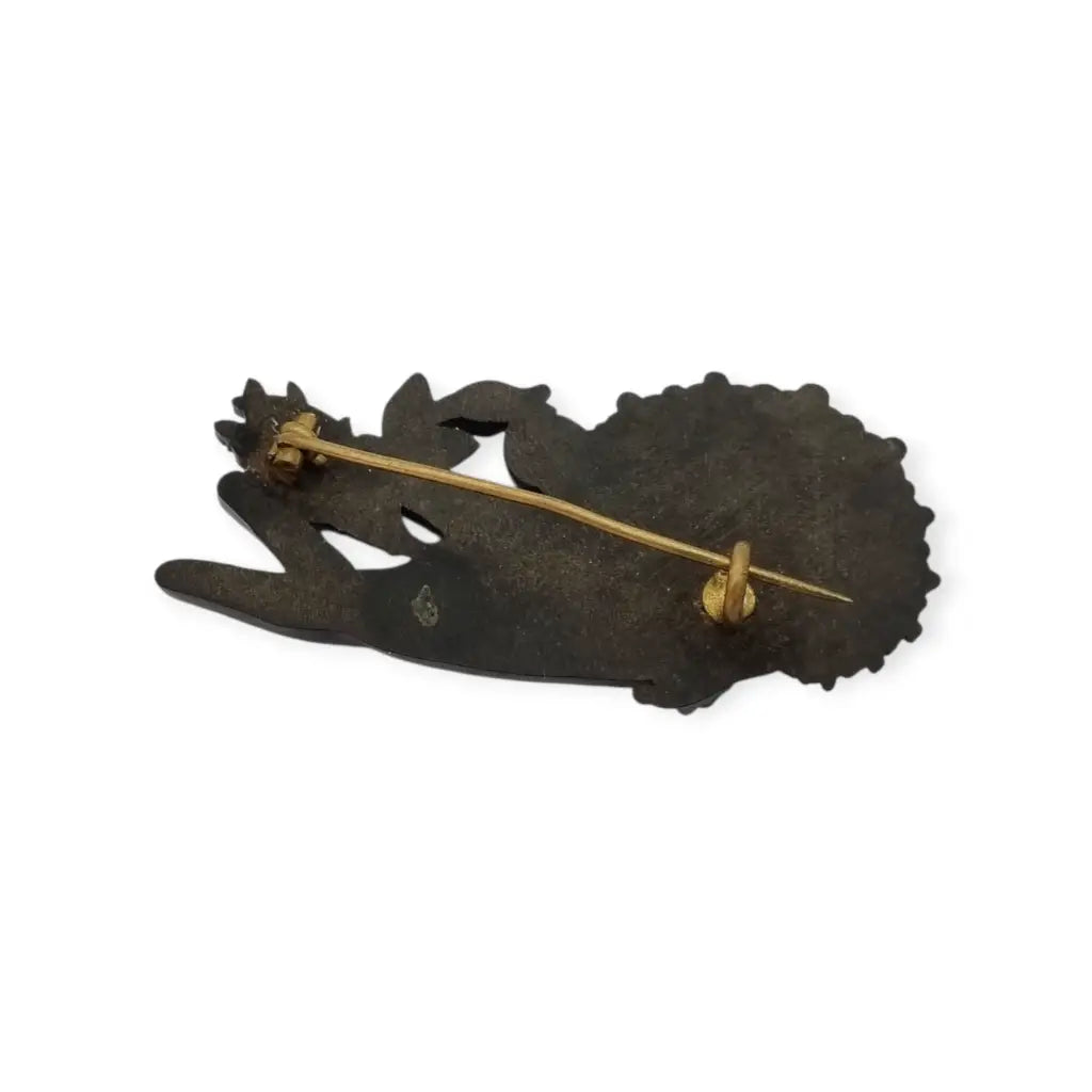 Broche antiguo victoriano en forma de mano sosteniendo flor Vulcanita Joya