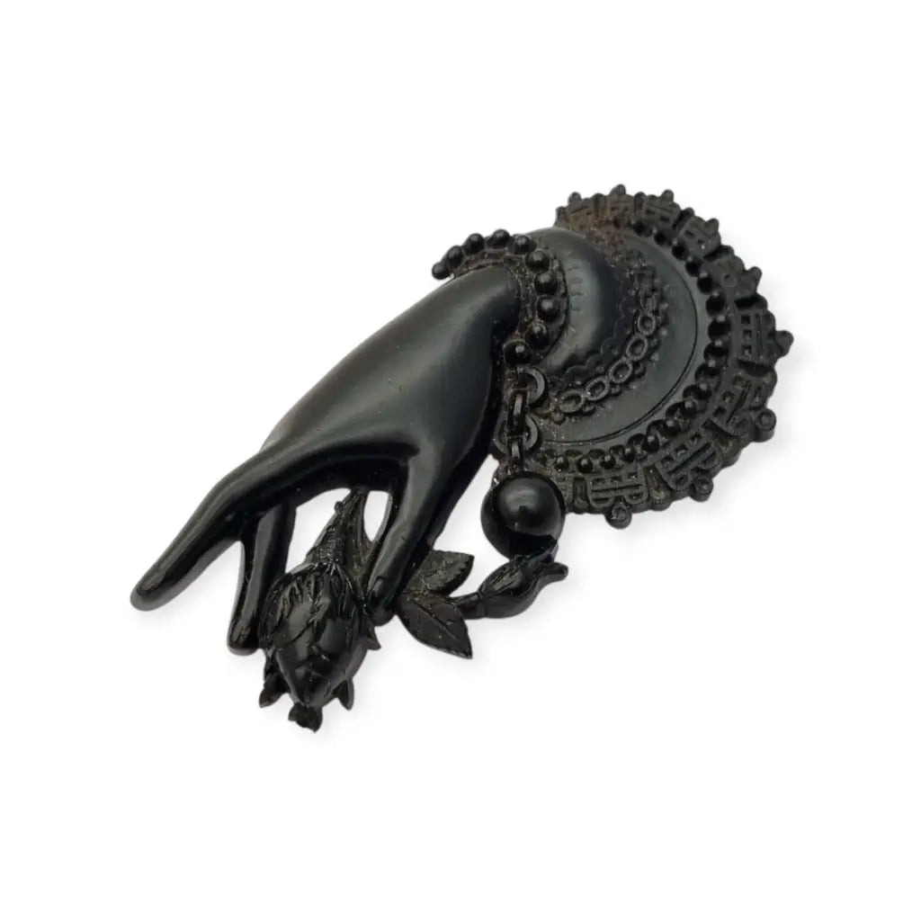 Broche antiguo victoriano en forma de mano sosteniendo flor Vulcanita Joya