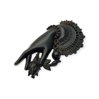 Broche antiguo victoriano en forma de mano sosteniendo flor Vulcanita Joya