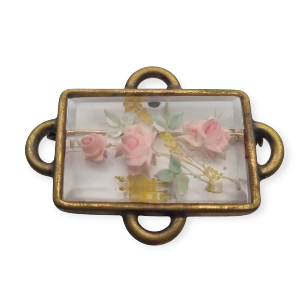 Broche Art Déco rectangular vintage con flores en lucita de los años 40.