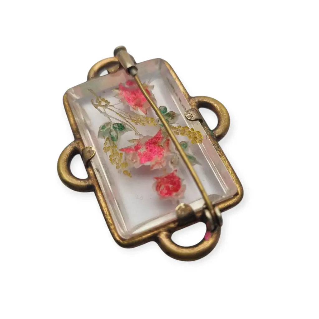 Broche Art Déco rectangular vintage con flores en lucita de los años 40.