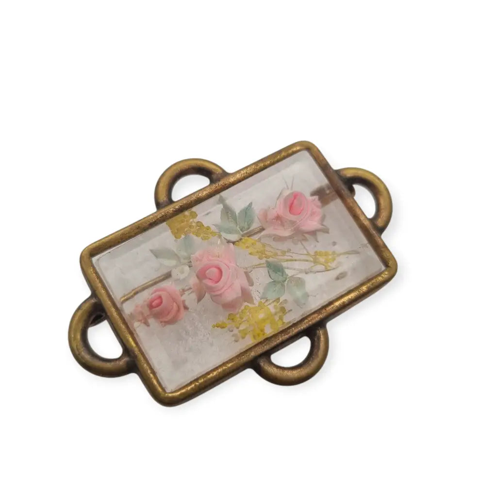 Broche Art Déco rectangular vintage con flores en lucita de los años 40.