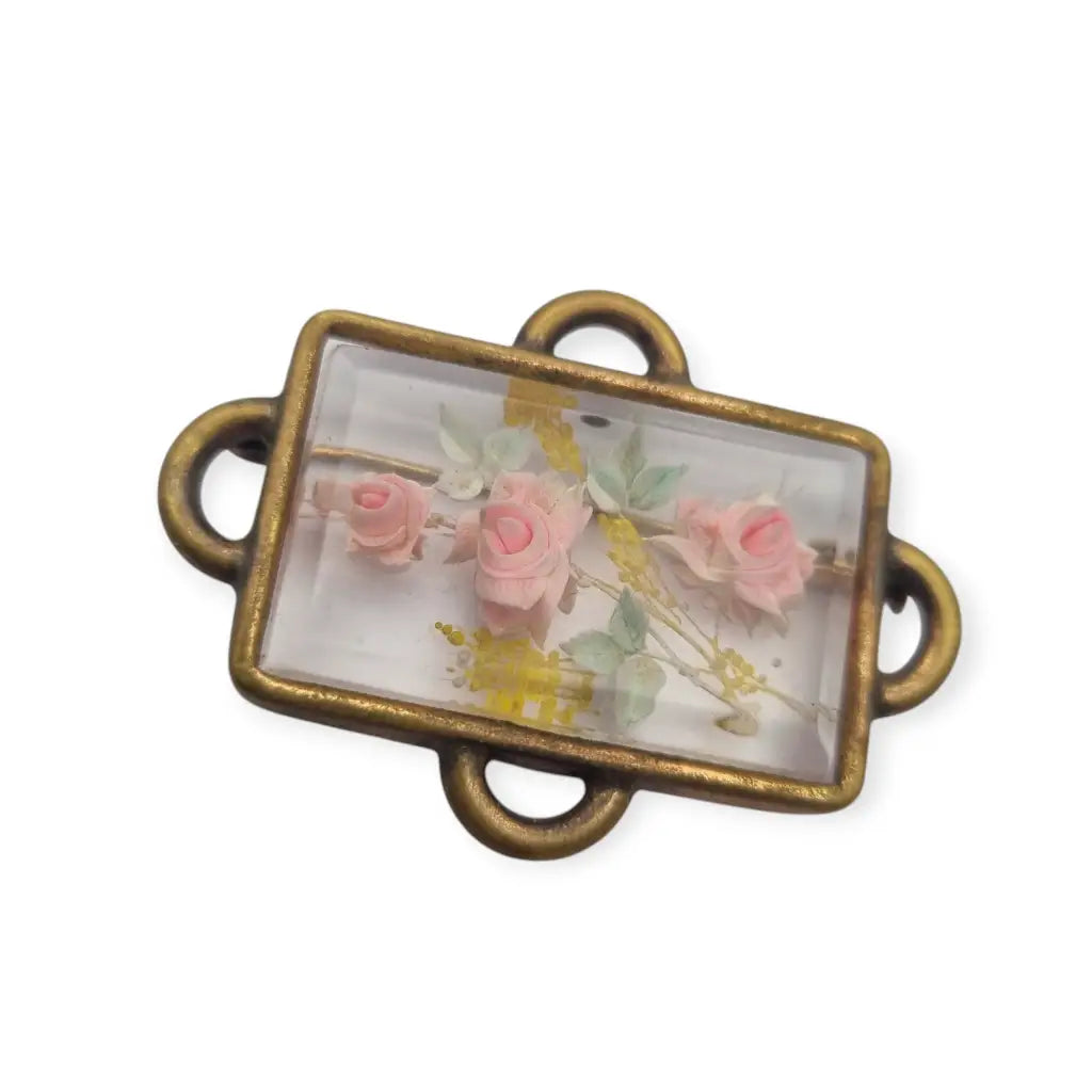 Broche Art Déco rectangular vintage con flores en lucita de los años 40.