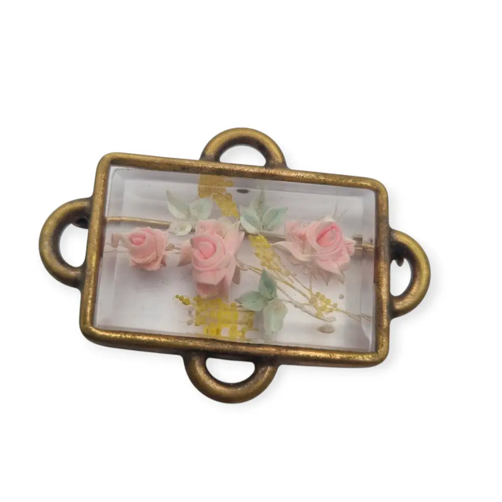 Broche Art Déco rectangular vintage con flores en lucita de los años 40.