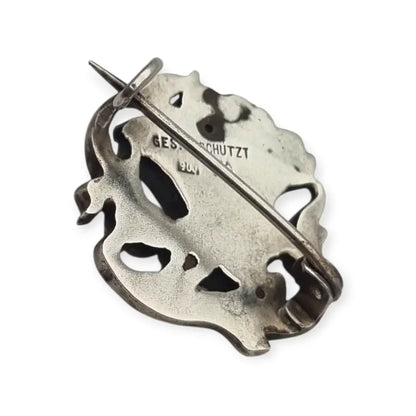 Broche Art Nouveau alemán en plata 900 GES GESCHÜTZT flor de iris relieve