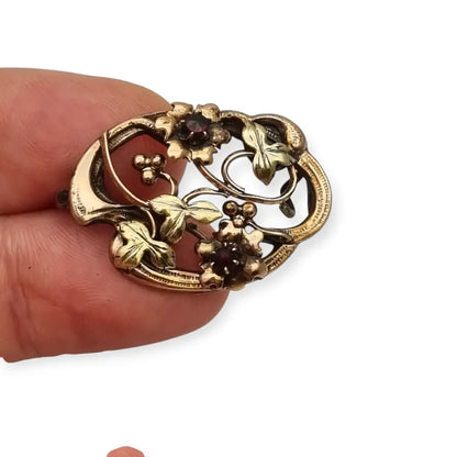 Broche Art Nouveau floral en oro laminado y rosa con granates el sello