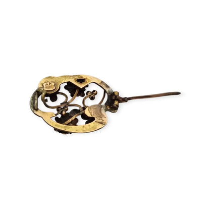Broche Art Nouveau floral en oro laminado y rosa con granates el sello