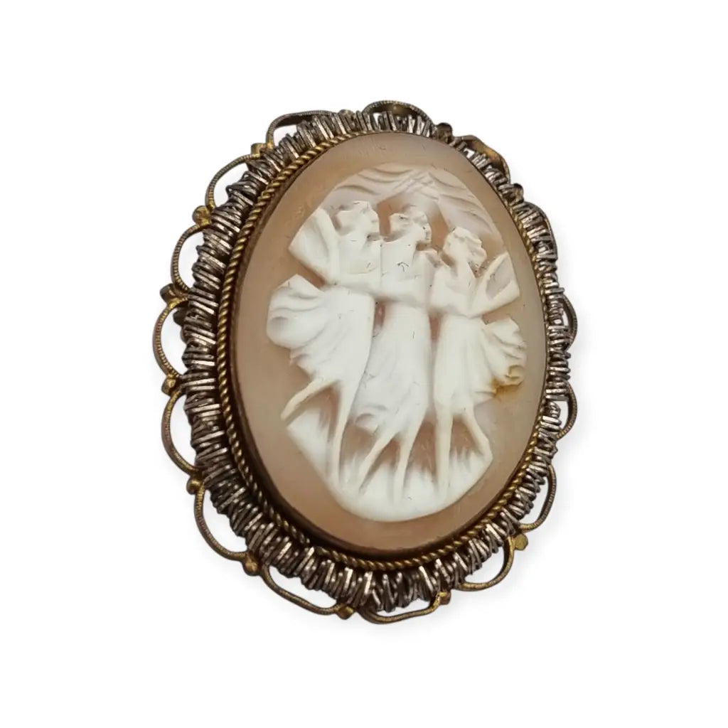 Broche camafeo antiguo concha tallada Tres Gracias montura dorada circa 1960.