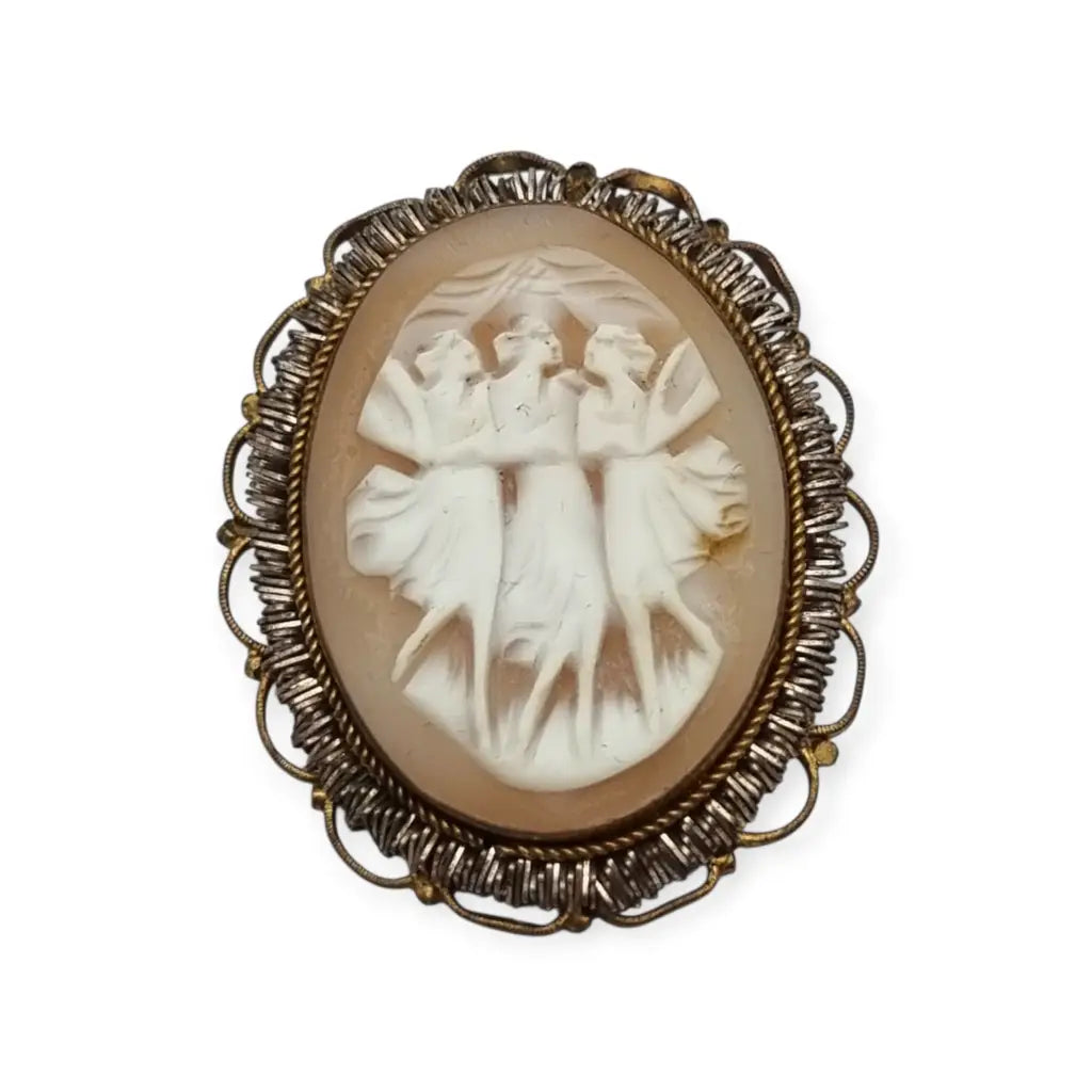 Broche camafeo antiguo concha tallada Tres Gracias montura dorada circa 1960.