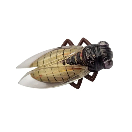 Broche cigarra vintage francesa años 40-50 de lucite en tonos marrones.