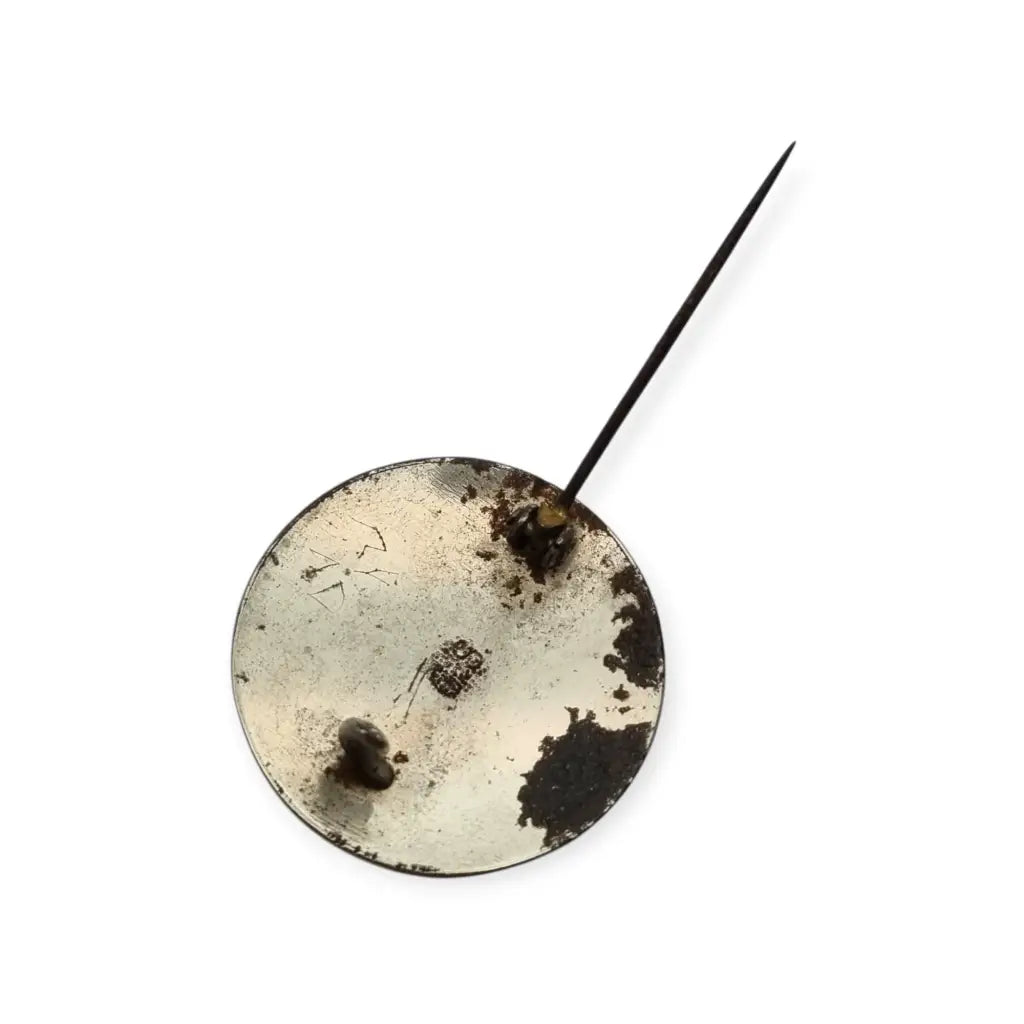 Broche damasquinado oro de Toledo con motivo pájaro grabado años 1920.