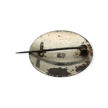 Broche damasquinado oro de Toledo con motivo pájaro grabado años 1920.