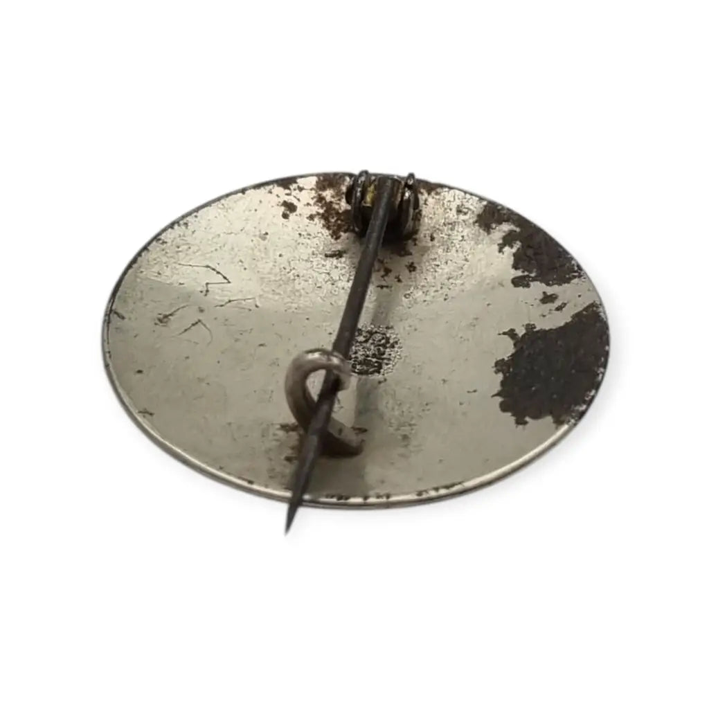 Broche damasquinado oro de Toledo con motivo pájaro grabado años 1920.